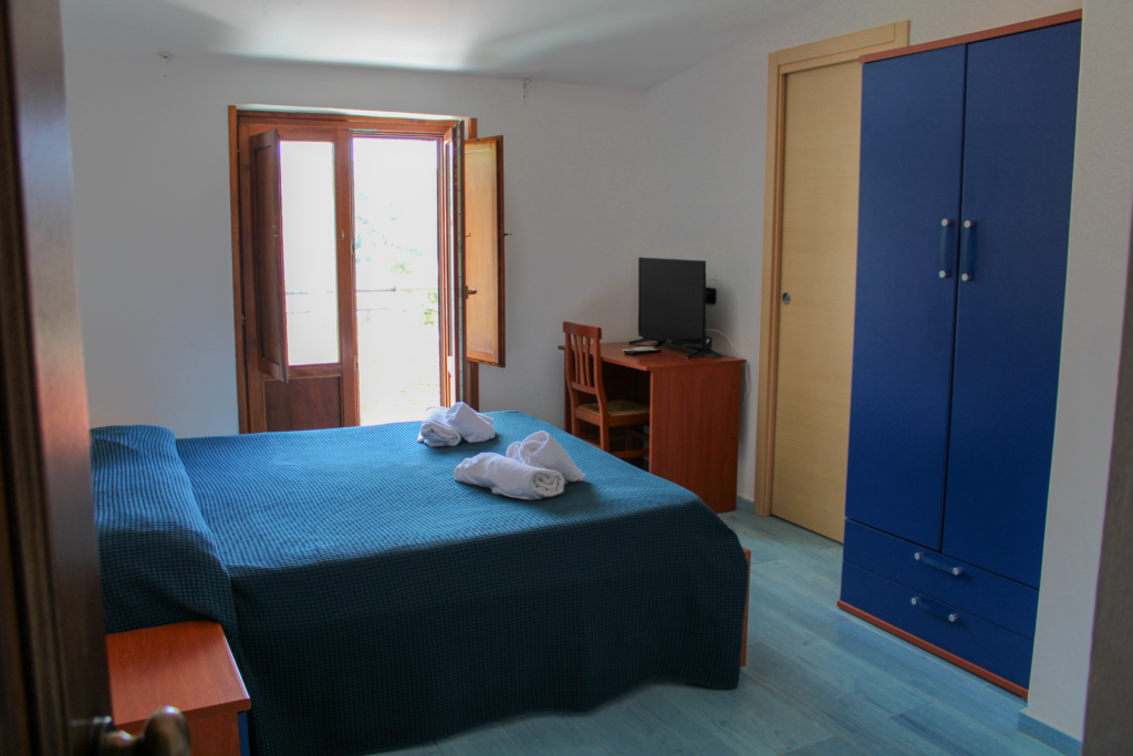 Foto Camera Poppa Hotel Riccio
